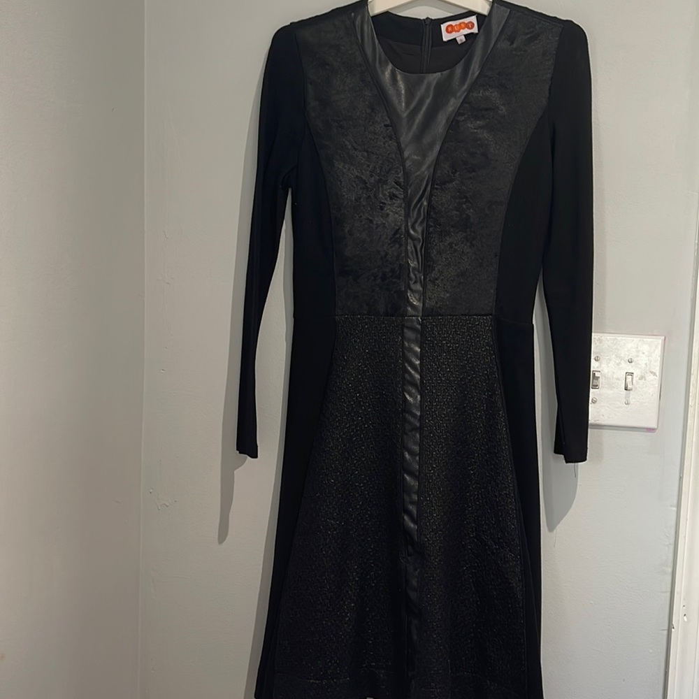 Black long sleeve, knee length dress